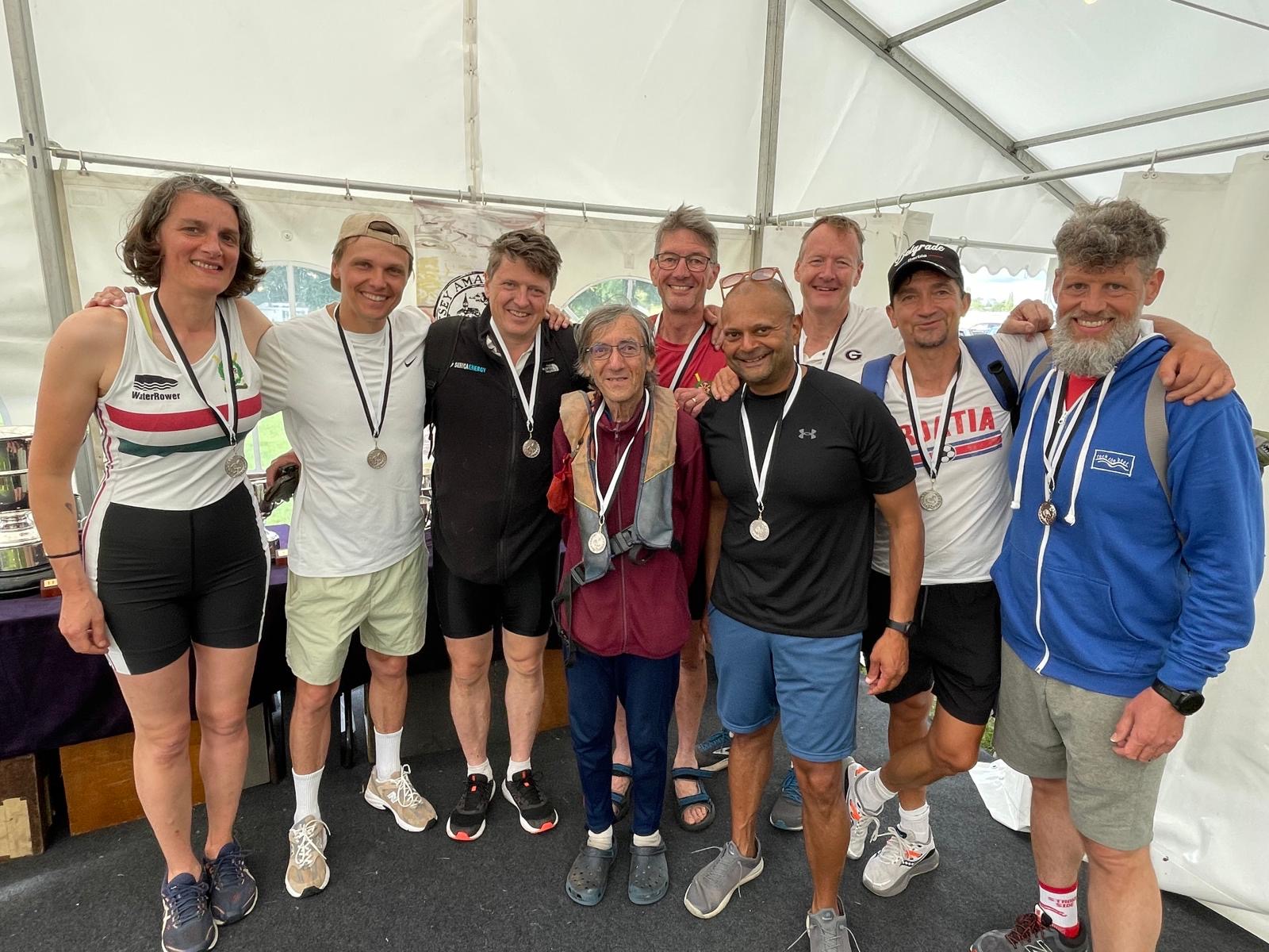 Isabelle Meron, Grigoriy Kozin,   Philip Hindley, Kim Williams, cox Woody, Jay Sitaraman, Tim Primmer, Michael Tchoubouroff and  Nathan Goodman with their winners' medals.